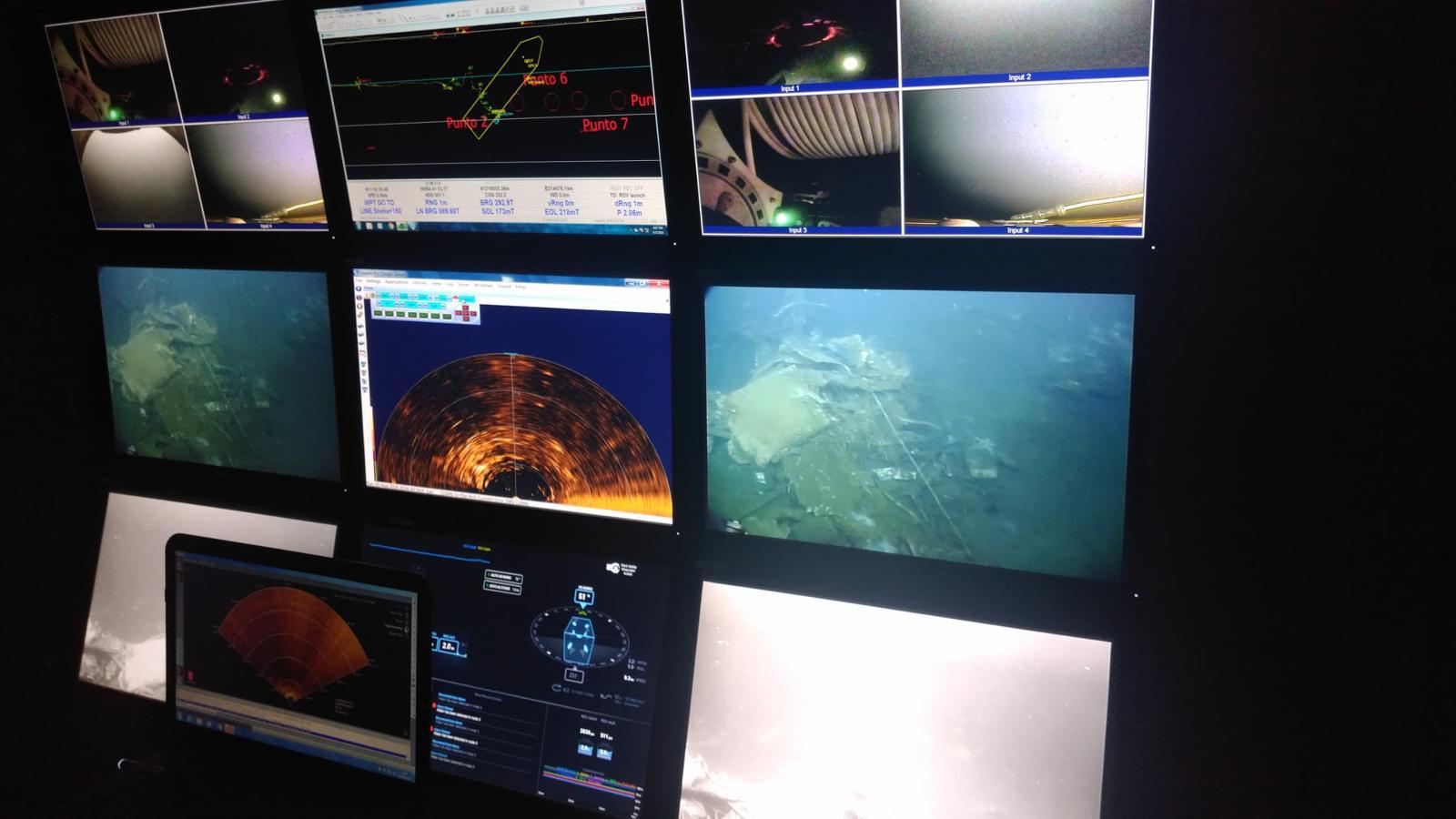 Multi-monitor ROV control room with sonar and live video feeds